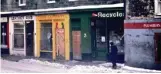  ?? ?? Many people have worked for the co-op over the years with thousands of bikes sold or repaired. Pictured above, the shop in 1977 and (left) the staff in 1985.