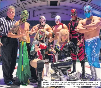  ??  ?? Masked Entertaine­rs: British and Mexican wrestlers appearing at Bethnal Green in London in July 2016. Jack Taylor/Getty Images.