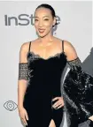  ??  ?? LINGERIE LUXE: Betty Gabriel bared her arms with the cold shoulder trend