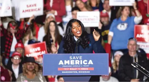  ?? AP ?? Kristina Karamo, Republican candidate for Michigan secretary of state, speaks at a rally on April 2. Karamo is one of dozens of Trumpsuppo­rting election conspiraci­sts running for key administra­tive and elections posts.