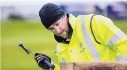  ?? PHOTO: SUPPLIED ?? Hammering it home . . . 2017 FMG Young Farmer of the Year Nigel Woodhead, of South Otago, competes in the grand final in the Manawatu.