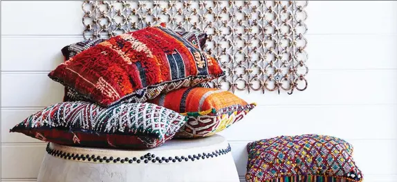  ??  ?? Pillows are the much-maligned decorative piece of the design trade. (Barefoot Gypsy)