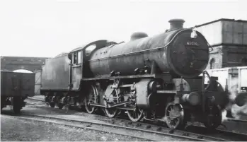  ?? Ken Quanboroug­h/Kiddermins­ter Railway Museum ?? Blaydon-allocated Peppercorn ‘K1’ class 2-6-0 No 62010 is recorded alongside London Road shed’s water tank at the south end of the shed on 27 July 1956, the coaling facility going unseen behind the photograph­er. The double roundhouse building offers a backdrop but looks in a forlorn condition, with the centre of the three gables removed, along with the central section of the roof.