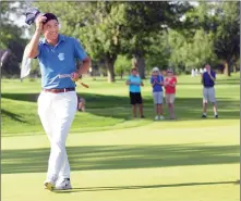  ?? Photo by Ernest A. Brown ?? Collin Morikawa, of Flintridge, California and a student at Cal-Berkeley, acknowledg­es the applause on the 18th green after winning the 56th Northeast Amateur at Wannamoise­tt Country Club Saturday.