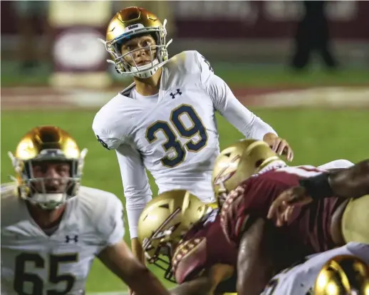  ?? GARY MCCULLOUGH/AP ?? Jonathan Doerer, who has been working on his mental game for years, converted his first chance at a game-winning kick with Notre Dame in the opener.