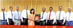  ??  ?? Commercial Bank Chairman Justice K. Sripavan (4th from right) and Chairperso­n of Mother Sri Lanka Dr. Janaki Kuruppu exchange the agreement in the presence of (from left) Mother 2QH +@MJ@ $WDBTSHUD"^ NLLHSSDD LDLADQ #DU@J@ 6HBJQ@L@RTQHX@ #HQDBSNQ 1H@Y 2@A@M $WDBTSHUD "NLLHSSDD LDLADQ HQ "GHDE ,@QRG@K &@F@M !TK@SGRHMFG@K@ @MC #HQDBSNQ 3GTRG@MSG@ *@QTM@M@X@JD "NLLDQBH@K !@MJŖR ,@M@FHMF #HQDBSNQ 2 1DMF@M@SG@M #DOTSX &DMDQ@K ,@M@FDQ Ŕ ,@QJDSHMF '@RQ@SG ,TM@RHMFGD @MC^ /QNIDBS "NNQCHM@SNQ "21 3QTRS ,@GDRG 1@SGM@X@JD