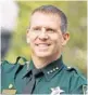  ?? ORLANDO SENTINEL ?? Orange County Sheriff John Mina is partnering in proposing what he called “a nonpartisa­n bill.”