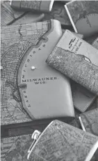  ?? ALIZA BARAN ?? Tactile Craftworks makes leather journals etched with maps of cities.