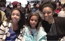  ?? MAUDLYNE IHEJIRIKA/ SUN- TIMES ?? Fromleft, Tenisha Diaz, 13, Ellani Diaz, 9, and their mother, Anisa Diaz, 42, came fromRacine to watch President Barack Obama’s farewell address at McCormick Place on Tuesday.