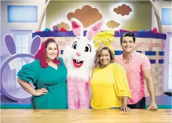  ?? FOOD NETWORK PHOTOS ?? Seven Easter-obsessed bakers create holiday masterpiec­es in the “Easter Basket Challenge,” which premieres March 1 on Food Network. The show features, from left, chef judge Claudia Sandoval, the Easter Bunny, host Sunny Anderson and chef judge Jordan Andino.