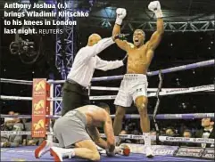  ?? REUTERS ?? Anthony Joshua (r.) brings Wladimir Klitschko to his knees in London last night.