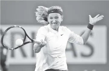  ??  ?? Victoria Azarenka of Belarus plays a forehand against Vera Lapko of Belarus during their womens singles first round match on day three of the BNP Paribas Open at the Indian Wells Tennis Garden on March 06, 2019 in Indian Wells, California. - AFP photo