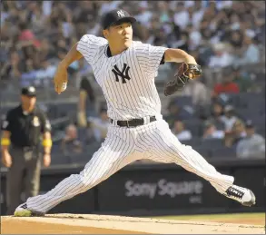  ?? Bill Kostroun / Associated Press ?? Yankees starting pitcher Masahiro Tanaka delivers against the Tigers during Saturday’s game in New York.