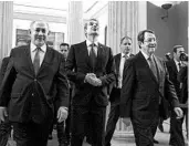  ?? YORGOS KARAHALIS/AP ?? Israeli’s Benjamin Netanyahu, left, Greece’s Kyriakos Mitsotakis, center, and Nicos Anastasiad­is of Cyprus arrive for Thursday’s signing ceremony in Athens.