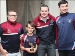  ??  ?? Under 12 player of the year Adam Cantwell with coaches Ryan Costigan, Dylan Moore and Luke Reilly.