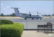  ?? ?? The private charter aircraft that transporte­d the migrants from New Mexico to Sacramento prepares to depart from the tarmac at Sacramento Executive Airport on Monday.