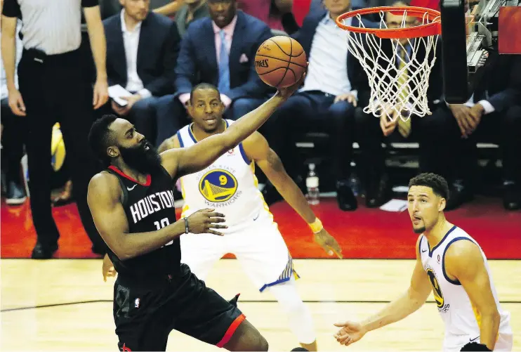  ?? — GETTY IMAGES ?? James Harden of the Rockets drives for the layup during Game 2 of the Western Conference Finals. Harden scored 27 as Houston routed Golden State 127-105.