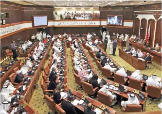  ?? — AP ?? MANAMA: In this file photo, Bahraini lawmakers participat­e in a special session of parliament to discuss how to handle the uprising in the Gulf island kingdom, convened in Manama, Bahrain.