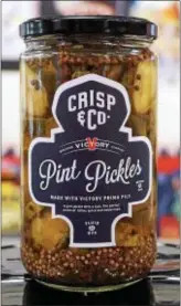  ?? PHOTO BY EMILY RYAN ?? Crisp & Co. collaborat­ed with Victory Brewing Company on Pint Pickles.