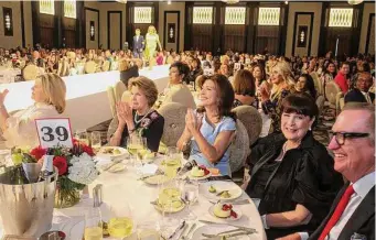  ?? ?? The Houston Chronicle Best Dressed Luncheon, which benefits the March of Dimes, featured a Naeem Khan fashion show presented by Neiman Marcus.