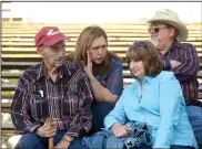  ?? NWA Democrat-Gazette/BEN GOFF • @NWABENGOFF ?? Frank Fitch (from left) sits Friday with his daughter-in-law Betty Fitch, son Nevada Fitch (Betty’s husband), and daughter Latonda Linker, all of Hindsville, during the third night of the Rodeo of the Ozarks at Parsons Stadium in Springdale.