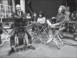  ?? JOSEPH LEDERER/NETFLIX ?? Director Barry Sonnenfeld, left, Louis Hynes (in back) and Neil Patrick Harris on set.