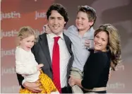  ?? ADRIAN WYLD /THE CANADIAN PRESS ?? Justin Trudeau, his wife Sophie and their children Ella-Grace and Xavier celebrate his leadership victory Sunday.