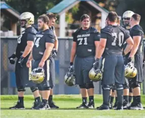  ??  ?? CU senior center Alex Kelley (74) is one of four offensive linemen who seem likely to start against CSU, but right tackle remains a battle. Cliff Grassmick, Daily Camera