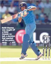  ??  ?? Rohit Sharma was caught off a Rubel Hossain noball, a decision that sparked off the controvers­y. — AFP