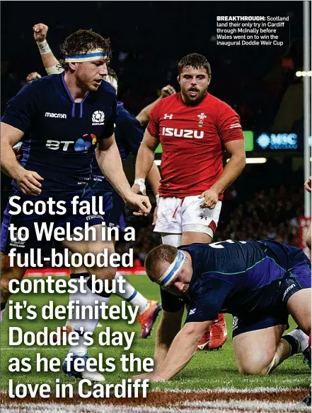  ??  ?? BREAKTHROU­GH: Scotland land their only try in Cardiff through McInally before Wales went on to win the inaugural Doddie Weir Cup