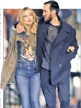  ??  ?? Kate Hudson, who’s facing a reopened custody battle over her 13-year-old with Chris Robinson — strolls in NYC with boyfriend Danny Fujikawa.