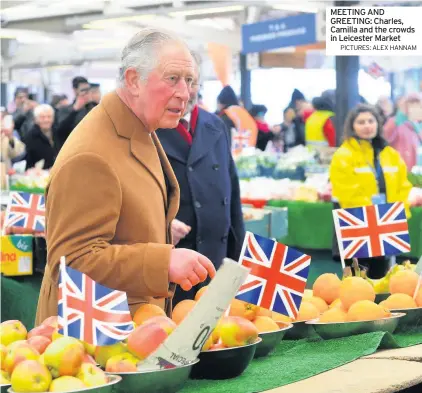  ?? PICTURES: ALEX HANNAM ?? MEETING AND GREETING: Charles, Camilla and the crowds in Leicester Market