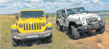  ??  ?? Top: The new Jeep Wrangler is the tough offroader it always was. Above: Boxy is best: Little has changed in the styling of the newgenerat­ion Wrangler, left, compared with the previous one.