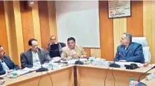  ??  ?? Ghaziabad Developmen­t Authority Chairman Sadakant chairs the meeting on Thursday