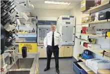  ?? CLIFFORD SKARSTEDT EXAMINER ?? City police Dep. Chief Tim Farquharso­n inside the forensic lab taken on Friday at police headquarte­rs on Water St. in Peterborou­gh.