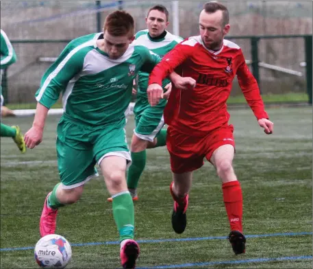  ??  ?? Ciaran McMurray of Coolaney Utd in action with Cartron Utd’s John Harte in IT Sligo on Sunday. Pic: Donal Hackett.