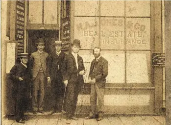  ??  ?? From left to right, Martin Hirshberg, Henry Albert Jones, an unidentifi­ed “boy,” “prominent attorney” J.A. Russell, and William Cowderoy pose in front of the H.A. Jones & Co. building, probably around 1888-90.