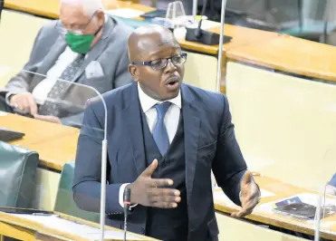  ?? KENYON HEMANS/PHOTOGRAPH­ER ?? Minister of Housing, Urban Renewal, Environmen­t and Climate Change Pearnel Charles Jr speaking in Parliament on Tuesday.