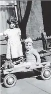  ??  ?? Jeanie Cosenzo and an unknown youngster play on Lett Street in LeBreton Flats in 1943.