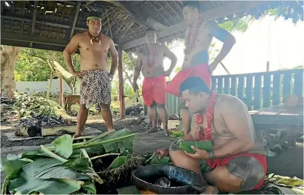  ?? LORNA THORNBER/STUFF ?? Preparing palusami (taro leaves and onions in coconut cream) to be cooked on the umu at Samoa Cultural Village.