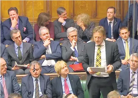  ??  ?? George Osborne (top right) just manages to find a seat on the back benches for PMQs yesterday, as he announced that he will, in fact, be giving up his constituen­cy seat in Tatton