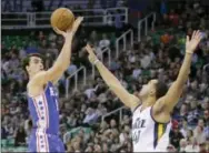  ?? RICK BOWMER — THE ASSOCIATED PRESS ?? Sixers forward Dario Saric and teammate Joel Embiid are two of the three finalists, announced Friday, for the NBA Rookie of the Year award.