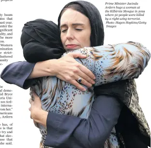  ?? Photo: Hagen Hopkins/Getty Images ?? Prime Minister Jacinda Ardern hugs a woman at the Kilbirnie Mosque in 2019 where 50 people were killed by a right-wing terrorist.