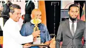  ??  ?? Inshaf Ahmed Ibrahim, circled, accepting an export award alongside his father Mohamed Ibrahim, centre