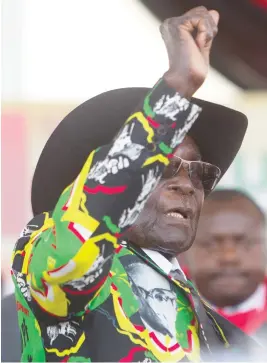  ??  ?? Zimbabwean President Robert Mugabe greets the crowd during his 93rd birthday celebratio­ns in Matopos on the outskirts of Bulawayo, Saturday. (AP)