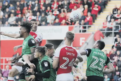  ??  ?? Rotherham United’s Richard Wood scores his side’s first goal in their League One play-off victory over Scunthorpe United at the AESSEAL New York Stadium.
