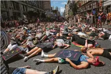  ?? Kena Betancur / Getty Images ?? The Queer Liberation March in New York City began as a protest of the much larger NYC Pride March, which some have accused of being too corporate-sponsored and restrictiv­e.