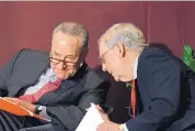  ?? TIMOTHY D. EASLEY/ASSOCIATED PRESS ?? Senate Minority Leader Chuck Schumer, D-N.Y., and Majority Leader Mitch McConnel, R-Ky., chat Monday at a University of Louisville appearance.