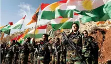  ?? AFP ?? Female Kurdish Peshmerga fighters are pictured at a base in the Irbil province, the capital of the autonomous Kurdish region of northern Iraq.