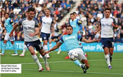  ?? ?? Ravel Morrison stretches to keep the ball in play.